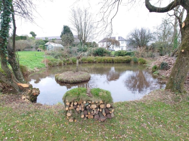Hibernaculum Created for Wildlife Refuge Hibernaculum Created for Wildlife Refuge in Pond in Devon