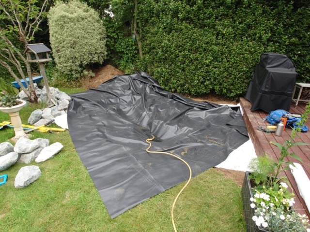 Liner Installed and Filling with Water Pond Liner Installation Devon