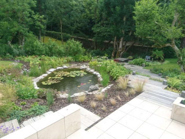View from Patio Looking Downhill Pond Landscaping Devon